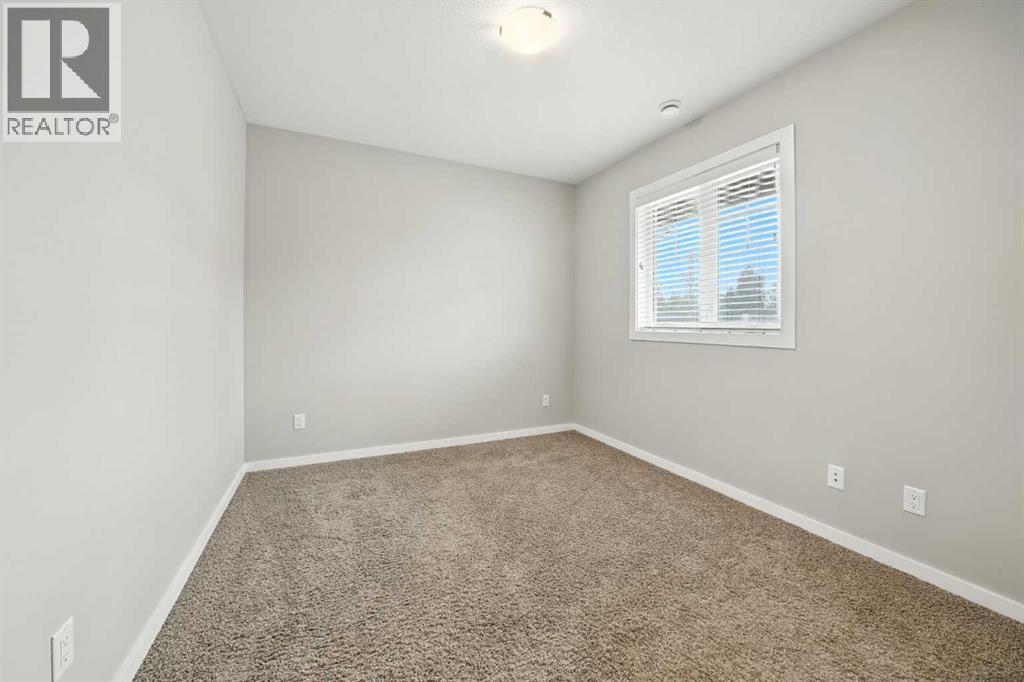 Photo 2 of 100 44 Reid Court, Sylvan Lake AB