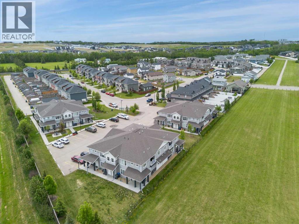 Photo 16 of 100 44 Reid Court, Sylvan Lake AB