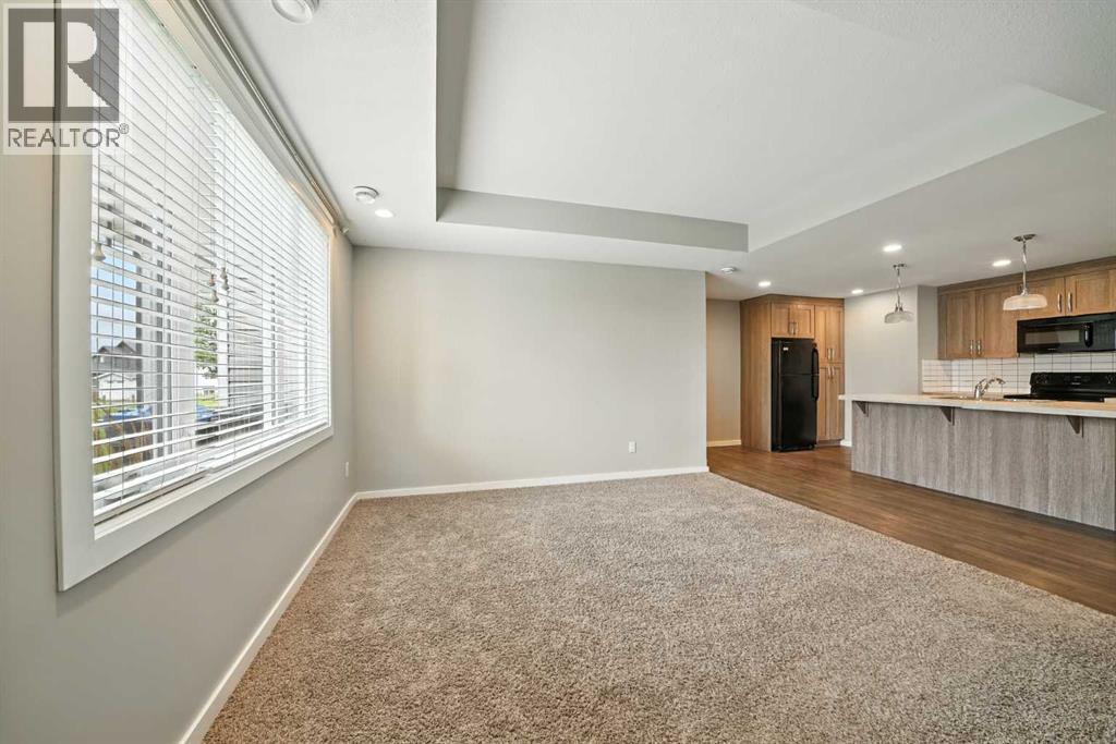 Photo 11 of 100 44 Reid Court, Sylvan Lake AB