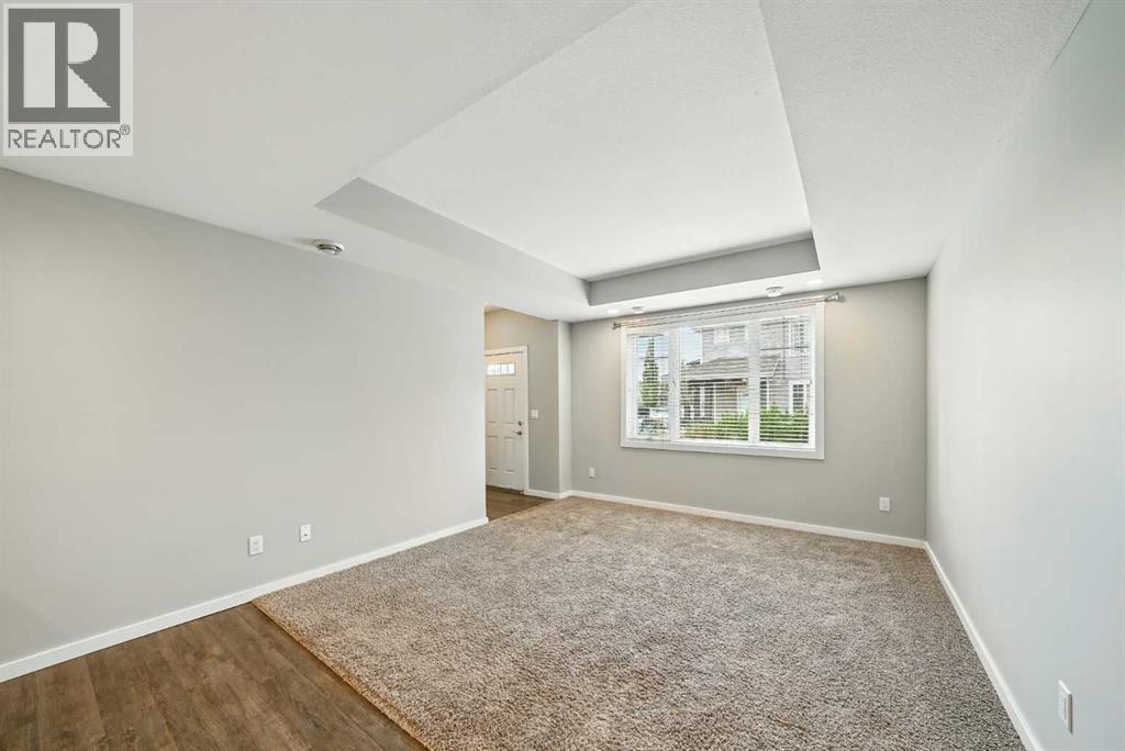 Photo 3 of 100 44 Reid Court, Sylvan Lake AB