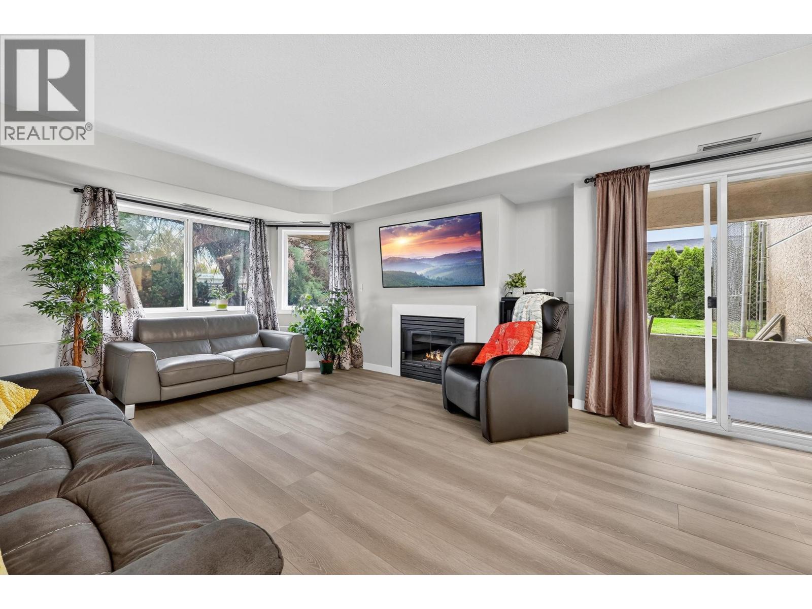 #105 3115 DE MONTREUIL COURT - Image 1