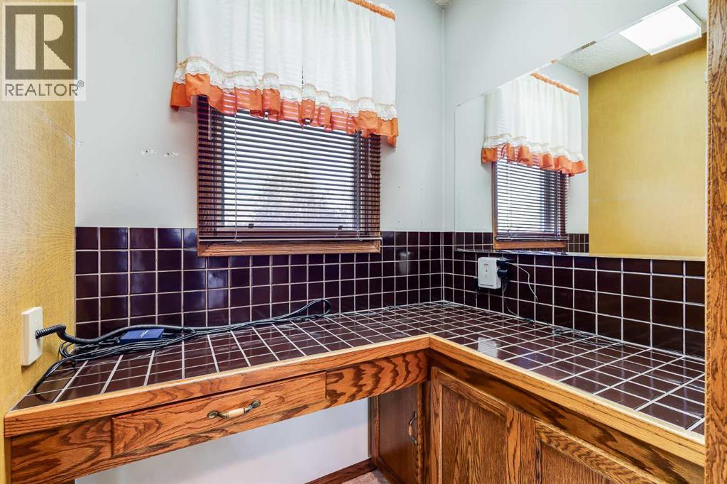 Single Family House Bungalow for Sale in  Marcombe Crescent NE Marlborough Calgary 