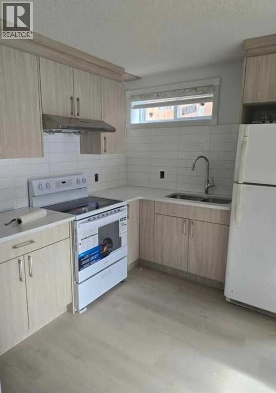 Single Family House Bi-level for Sale in  LA VALENCIA Gardens NE Monterey Park Calgary 