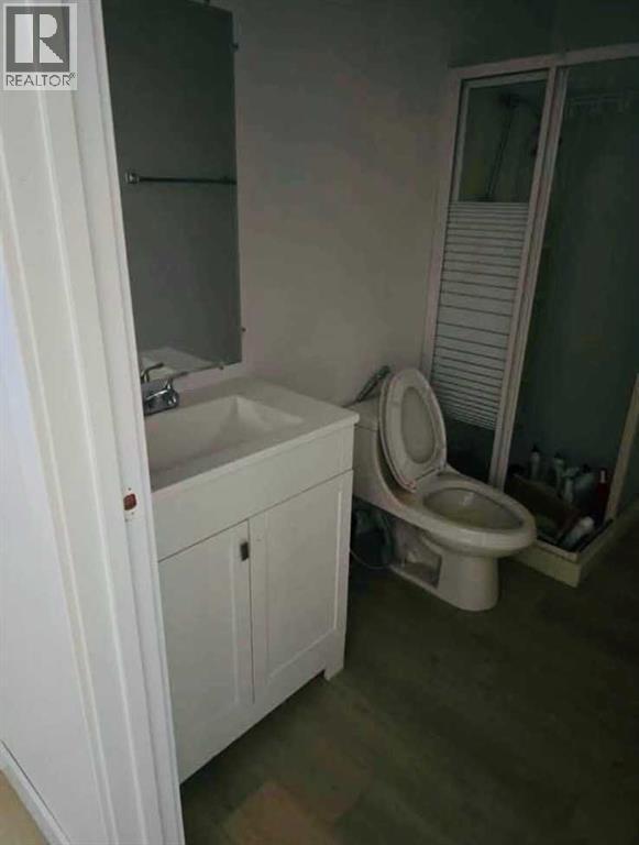 Single Family House Bi-level for Sale in  LA VALENCIA Gardens NE Monterey Park Calgary 