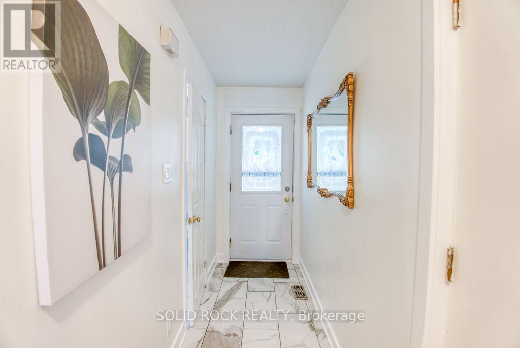 Entry way with inside access to garage