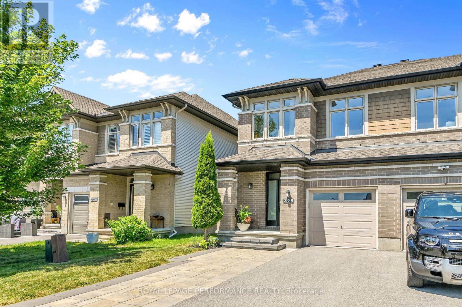 Inviting front entry w/transom window & sidelight