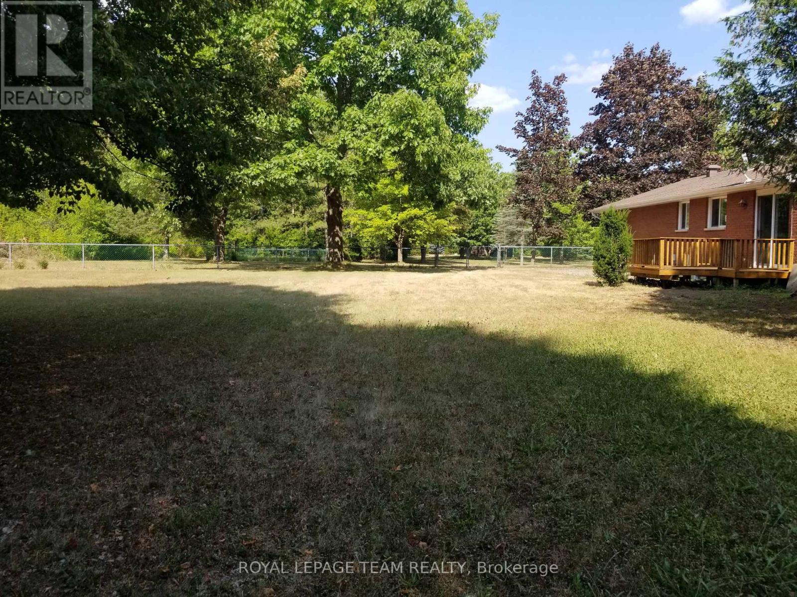 Rear yard view-Abundance of mature trees