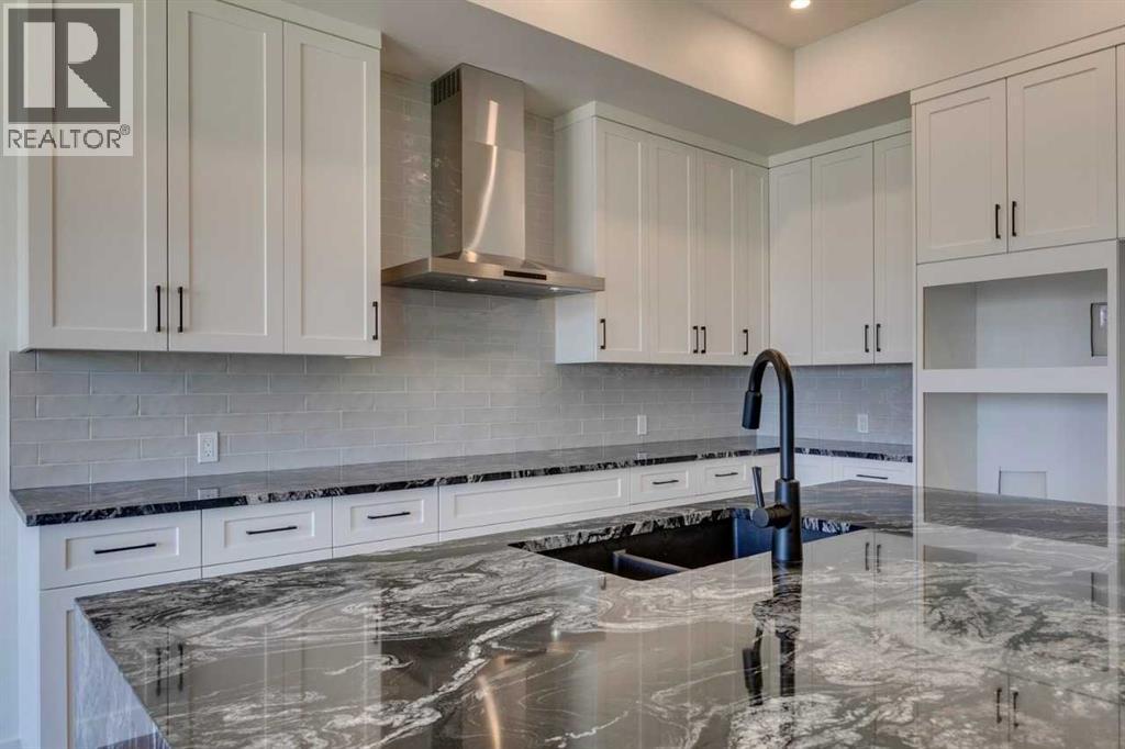 Photo 2 of 56 Dawson Wharf Mount, Chestermere AB