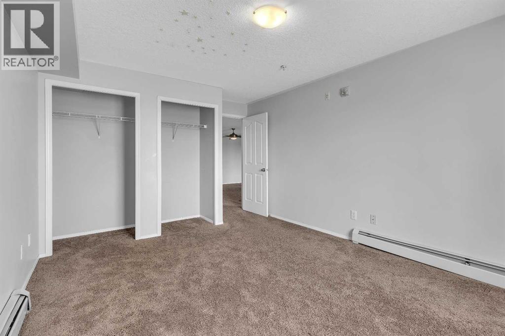 Photo 3 of 6307 304 Mackenzie Way Sw, Airdrie AB