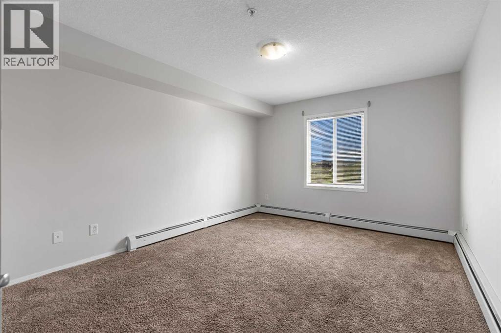 Photo 12 of 6307 304 Mackenzie Way Sw, Airdrie AB