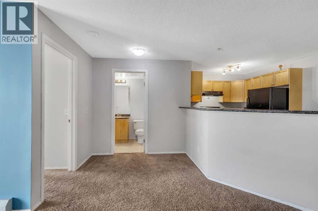 Photo 8 of 6307 304 Mackenzie Way Sw, Airdrie AB