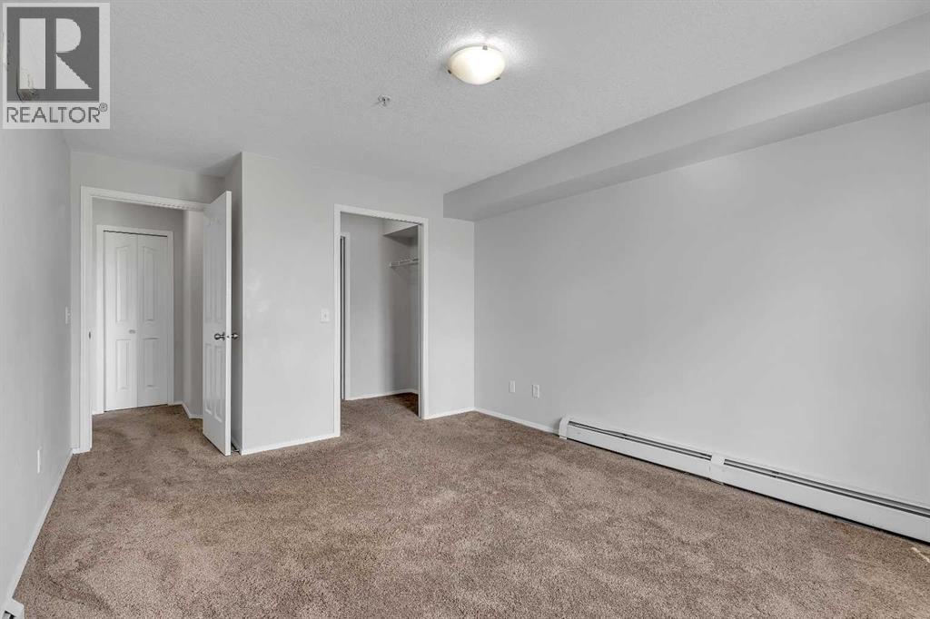 Photo 4 of 6307 304 Mackenzie Way Sw, Airdrie AB