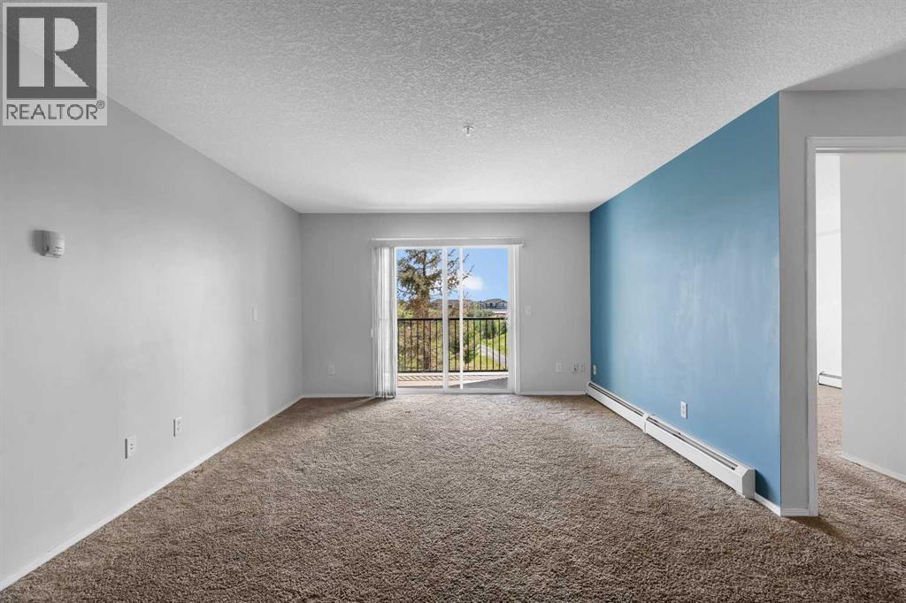 Photo 26 of 6307 304 Mackenzie Way Sw, Airdrie AB