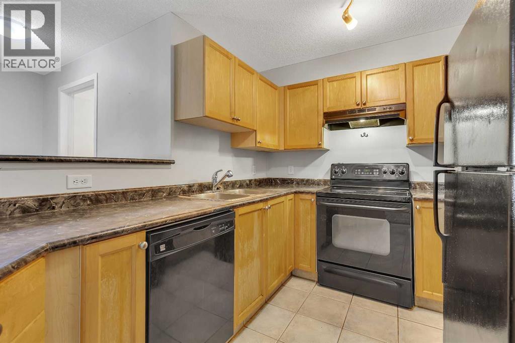 Photo 16 of 6307 304 Mackenzie Way Sw, Airdrie AB