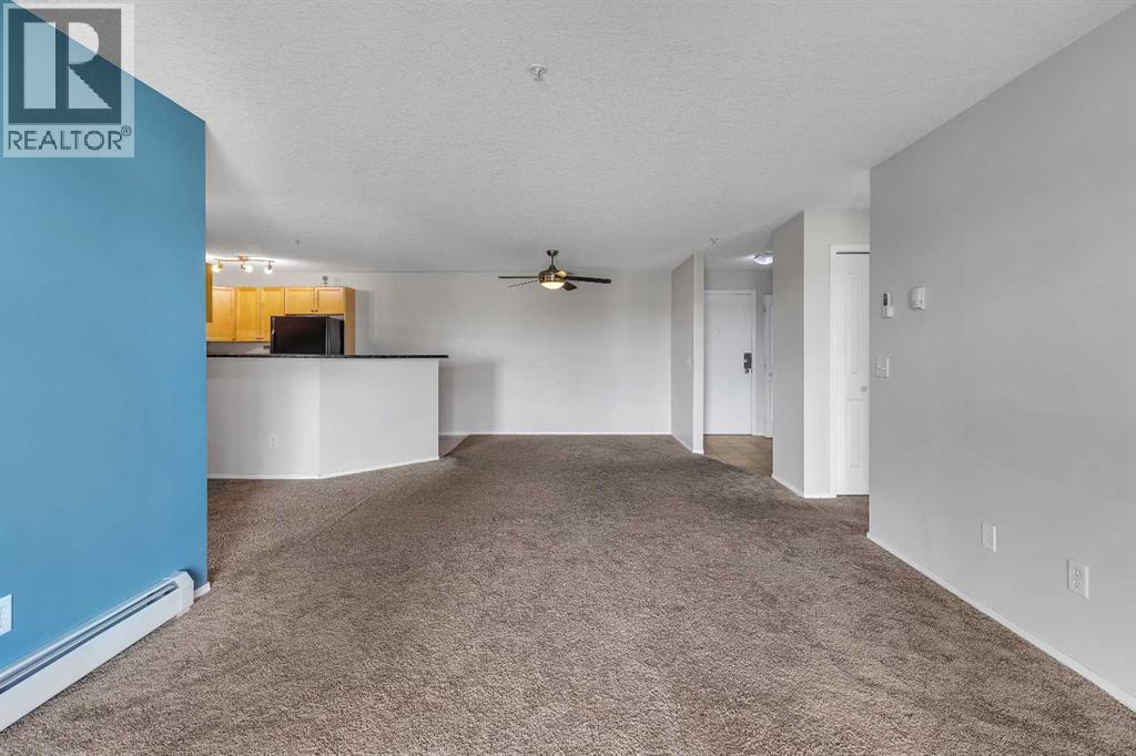 Photo 14 of 6307 304 Mackenzie Way Sw, Airdrie AB
