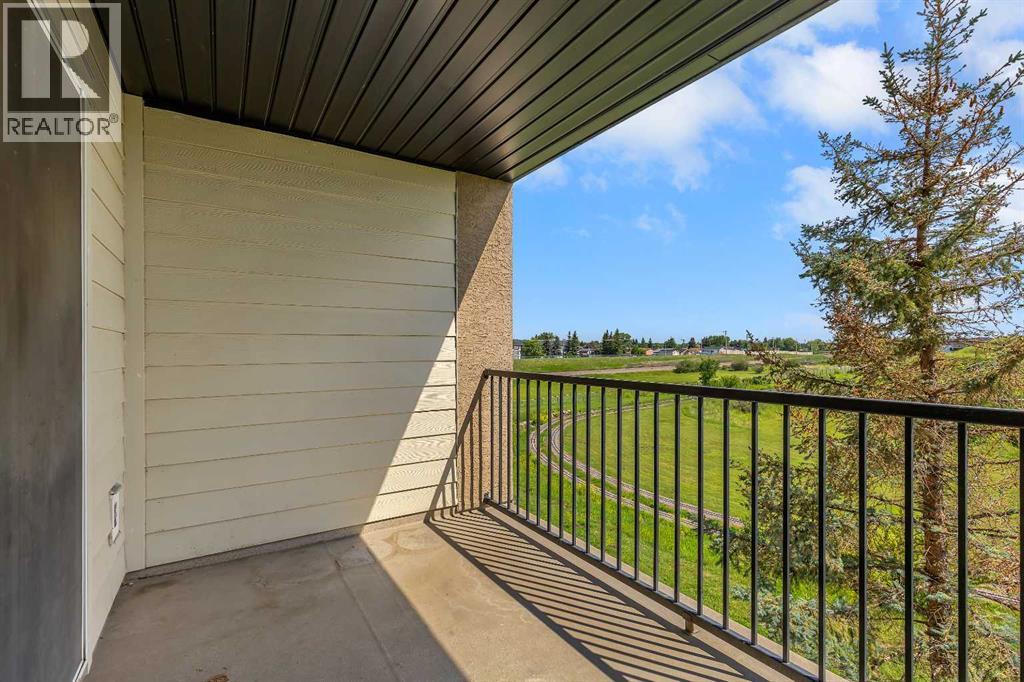 Photo 20 of 6307 304 Mackenzie Way Sw, Airdrie AB
