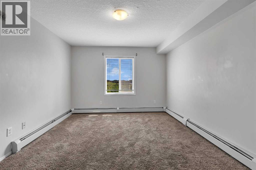 Photo 15 of 6307 304 Mackenzie Way Sw, Airdrie AB