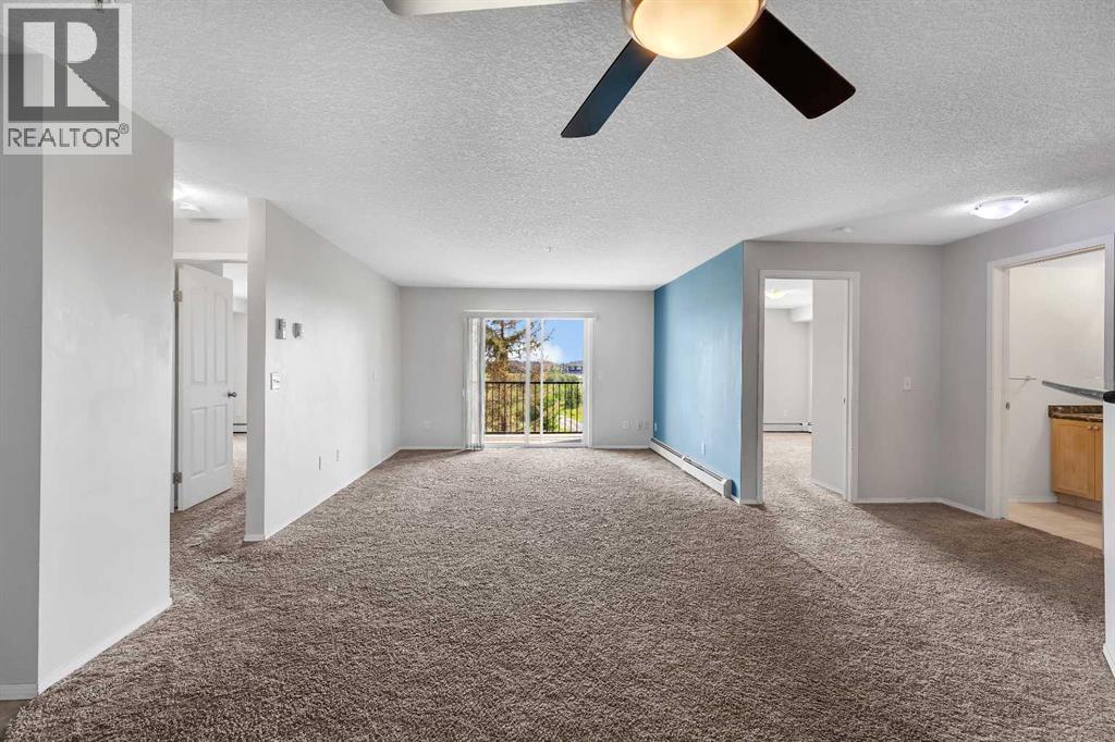 Photo 7 of 6307 304 Mackenzie Way Sw, Airdrie AB