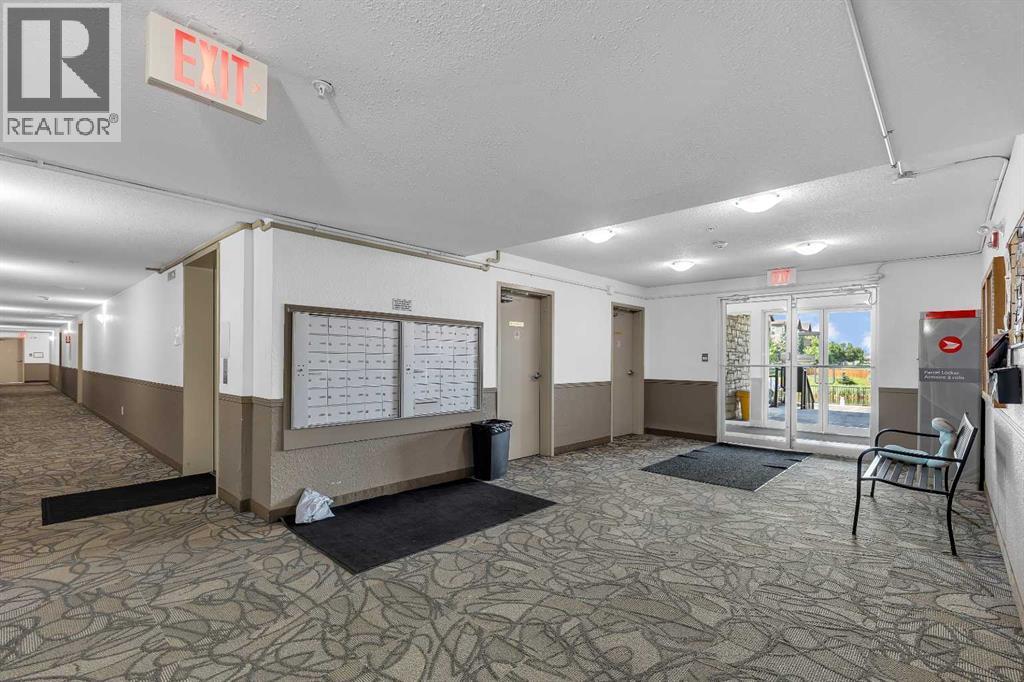 Photo 1 of 6307 304 Mackenzie Way Sw, Airdrie AB