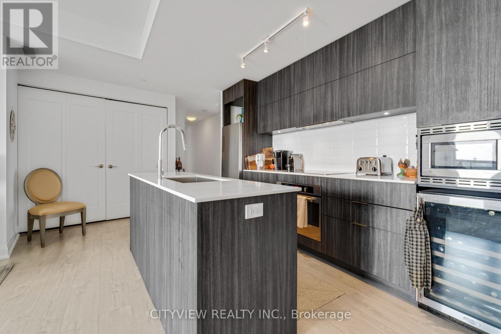 Photo 6 of 304 110 Marine Parade Drive, Toronto ON