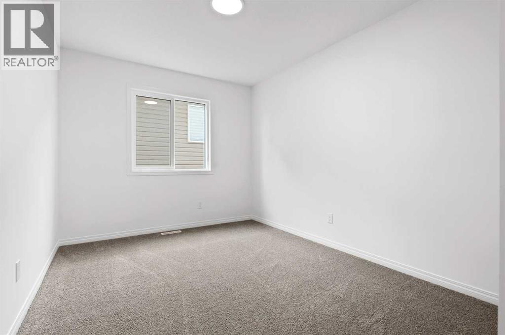 Photo 4 of 310 Montrose Crescent Se, High River AB