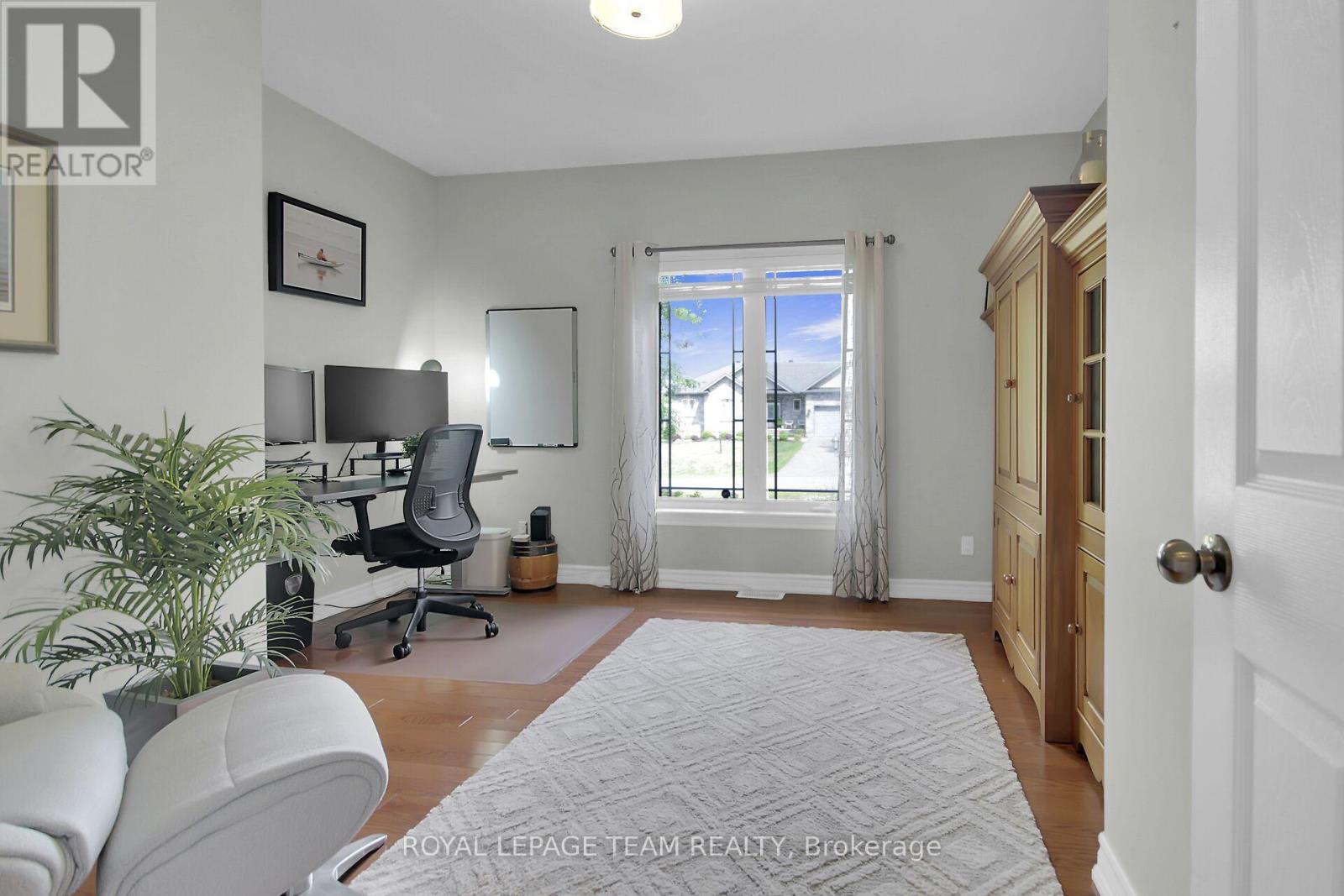 Home Office easily doubles as 4th Bedrm main level