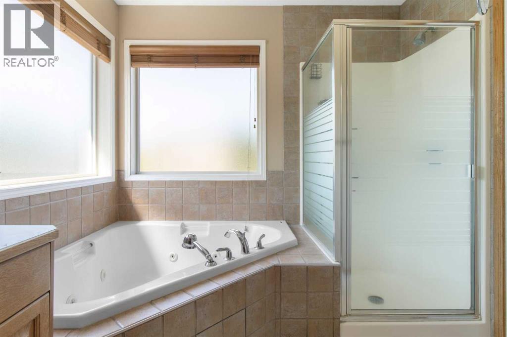 Single Family House for Sale in  Everwillow Close SW Evergreen Calgary 