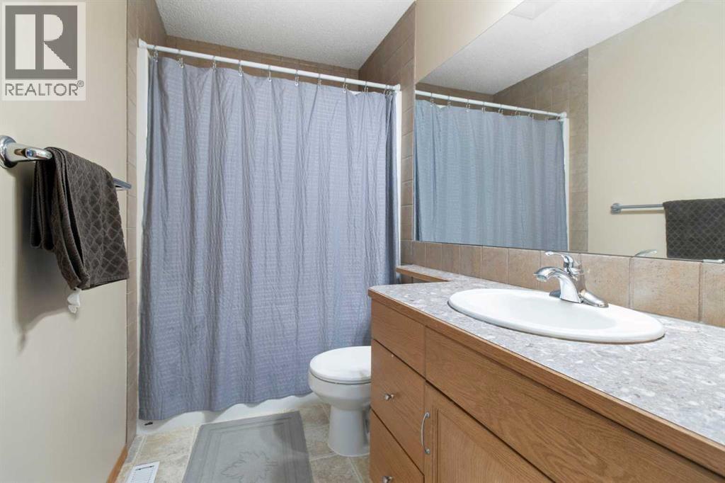 Single Family House for Sale in  Everwillow Close SW Evergreen Calgary 