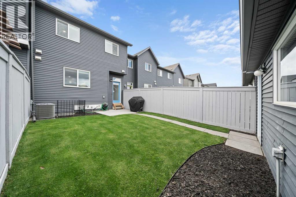 Single Family House for Sale in  Belmont Avenue SW Belmont Calgary 