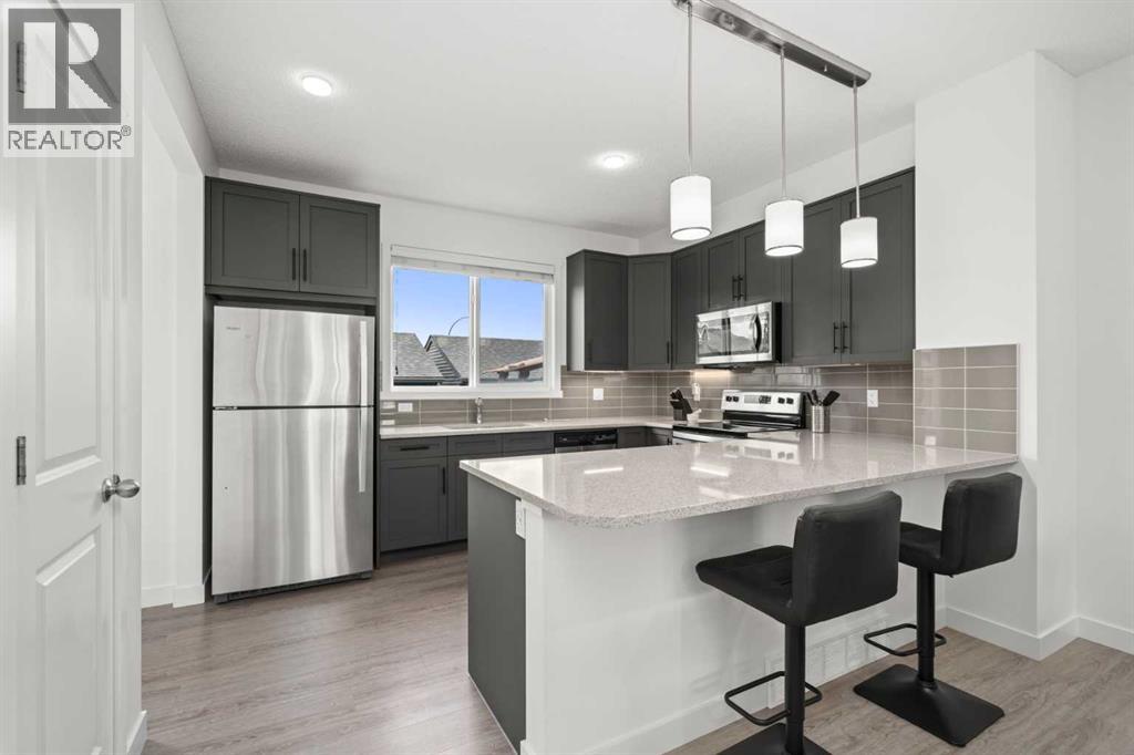 Single Family House for Sale in  Belmont Avenue SW Belmont Calgary 