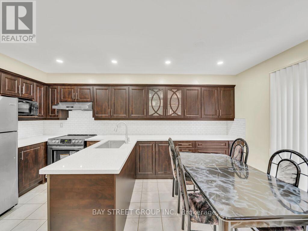 Photo 5 of 97 Quail Feather Crescent, Brampton ON