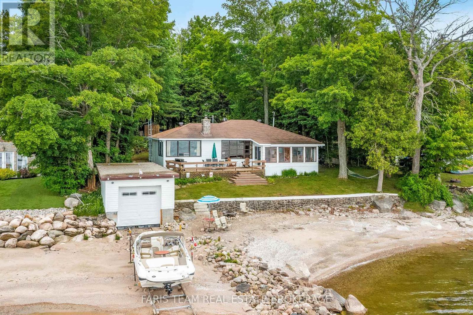 Photo 6 of 1697 Champlain Road, Tiny ON