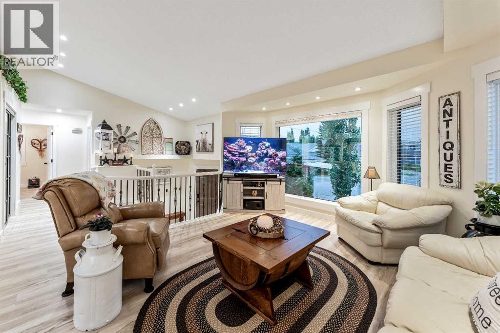 Single Family House Bi-level for Sale in  Riverstone Crescent SE Riverbend Calgary 