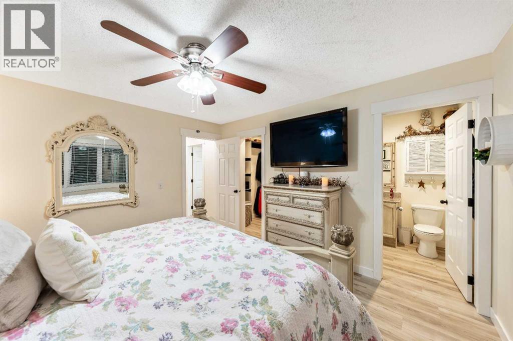 Single Family House Bi-level for Sale in  Riverstone Crescent SE Riverbend Calgary 
