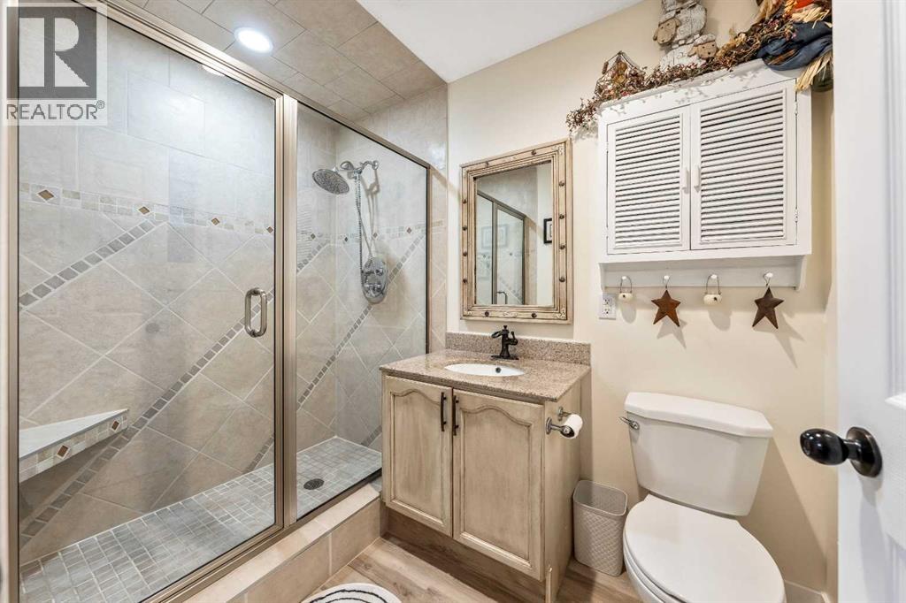 Single Family House Bi-level for Sale in  Riverstone Crescent SE Riverbend Calgary 