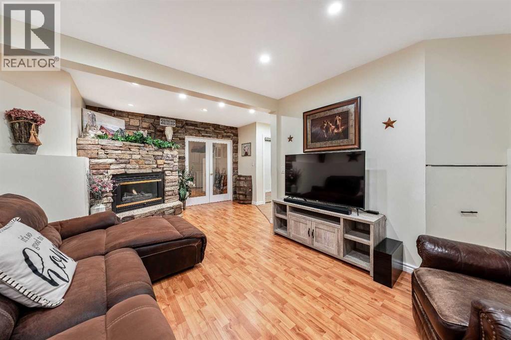 Single Family House Bi-level for Sale in  Riverstone Crescent SE Riverbend Calgary 
