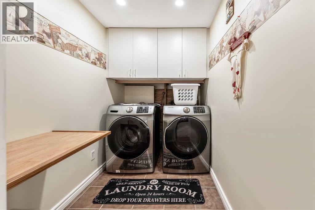 Single Family House Bi-level for Sale in  Riverstone Crescent SE Riverbend Calgary 