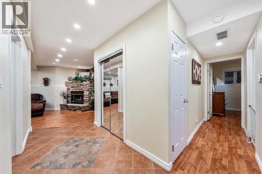 Single Family House Bi-level for Sale in  Riverstone Crescent SE Riverbend Calgary 