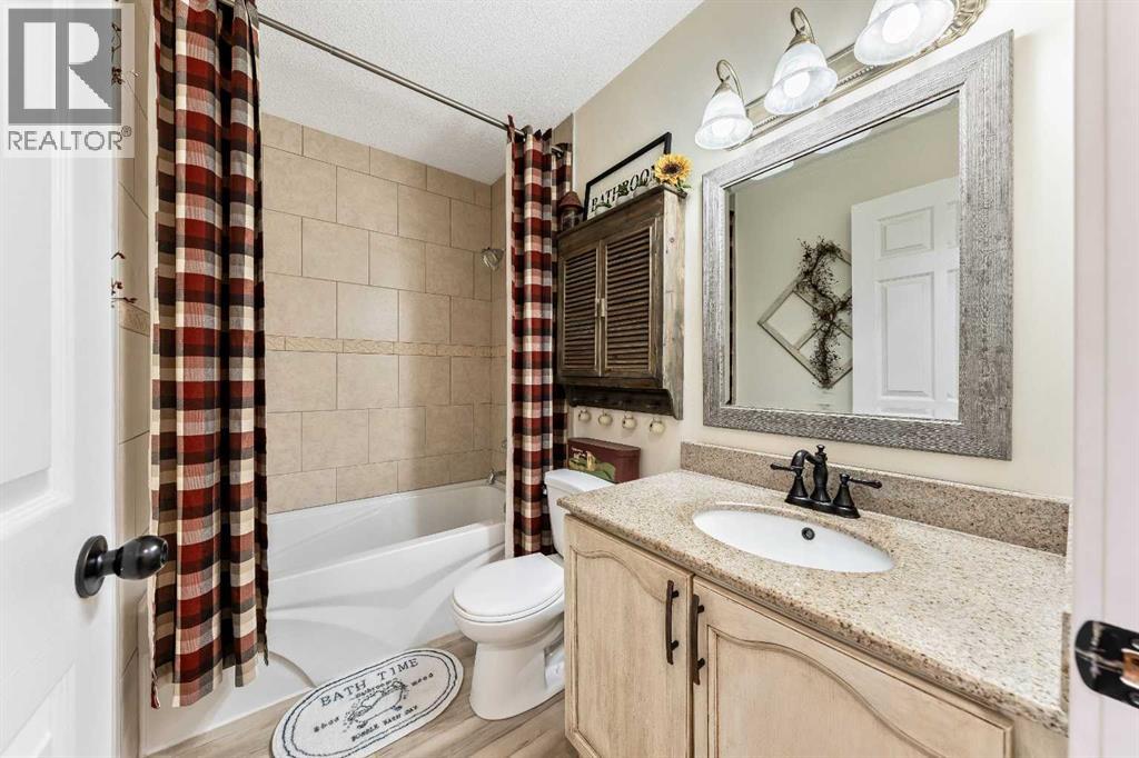 Single Family House Bi-level for Sale in  Riverstone Crescent SE Riverbend Calgary 