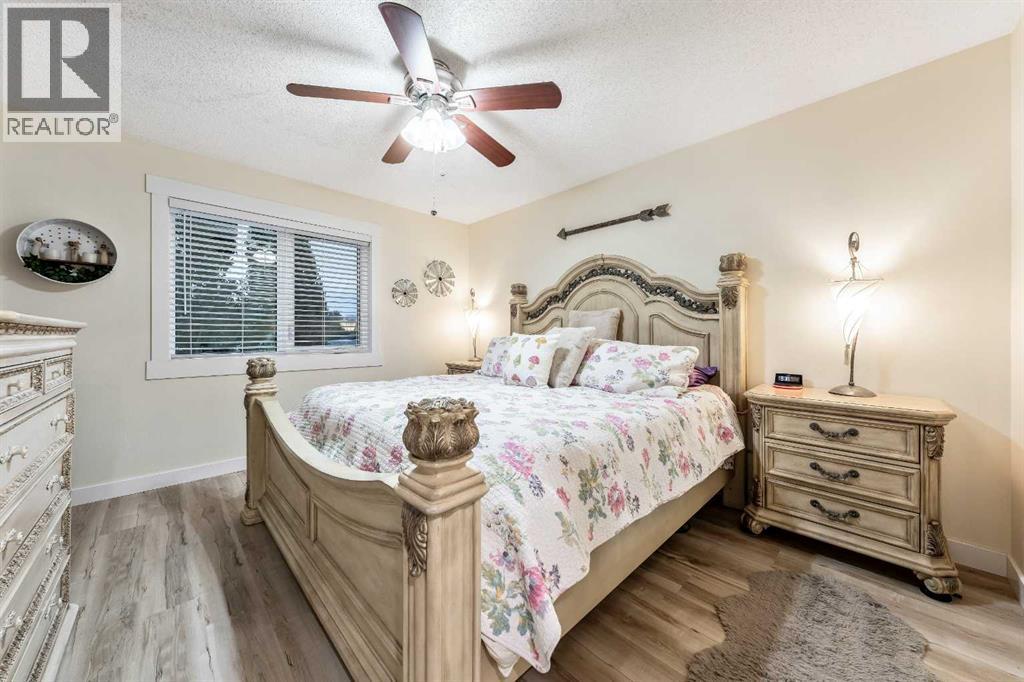 Single Family House Bi-level for Sale in  Riverstone Crescent SE Riverbend Calgary 