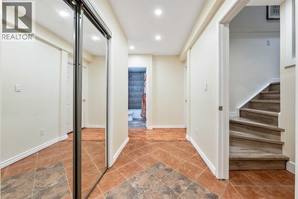 Single Family House Bi-level for Sale in  Riverstone Crescent SE Riverbend Calgary 