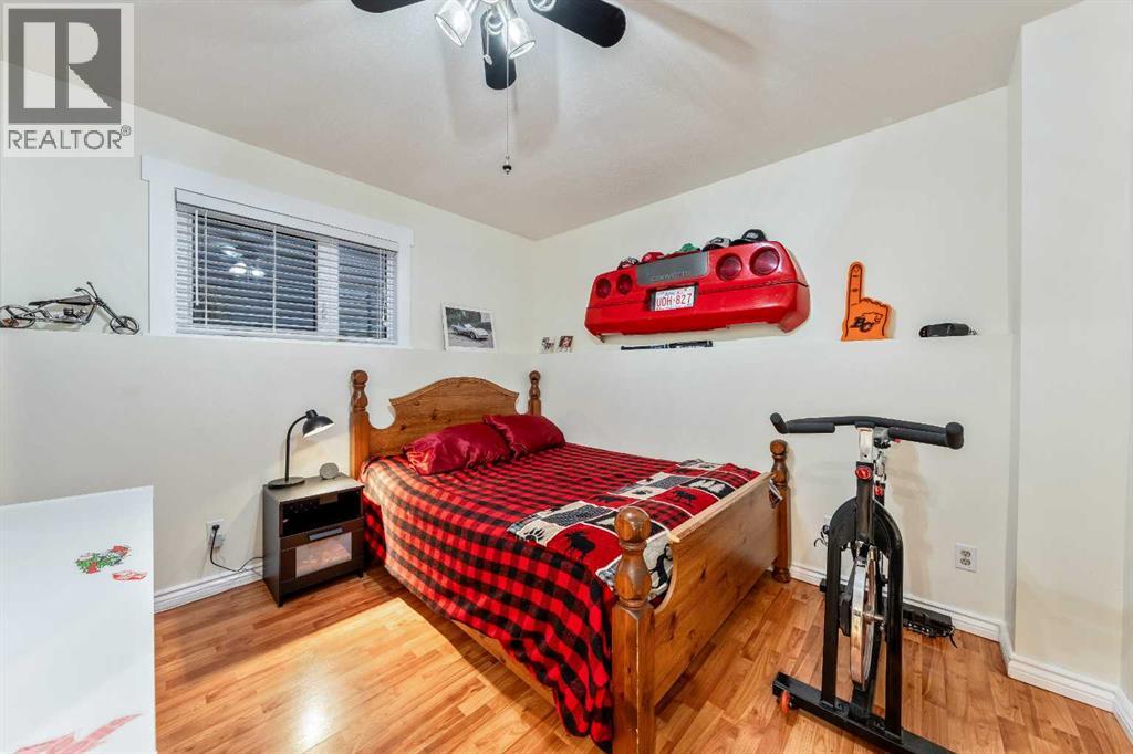 Single Family House Bi-level for Sale in  Riverstone Crescent SE Riverbend Calgary 