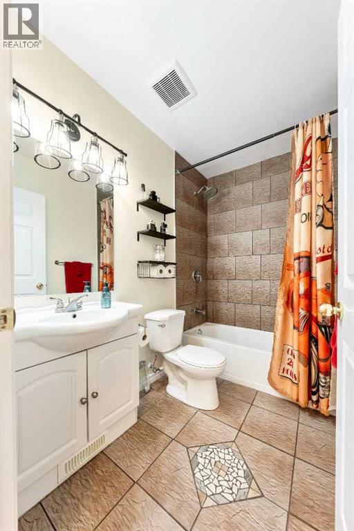 Single Family House Bi-level for Sale in  Riverstone Crescent SE Riverbend Calgary 