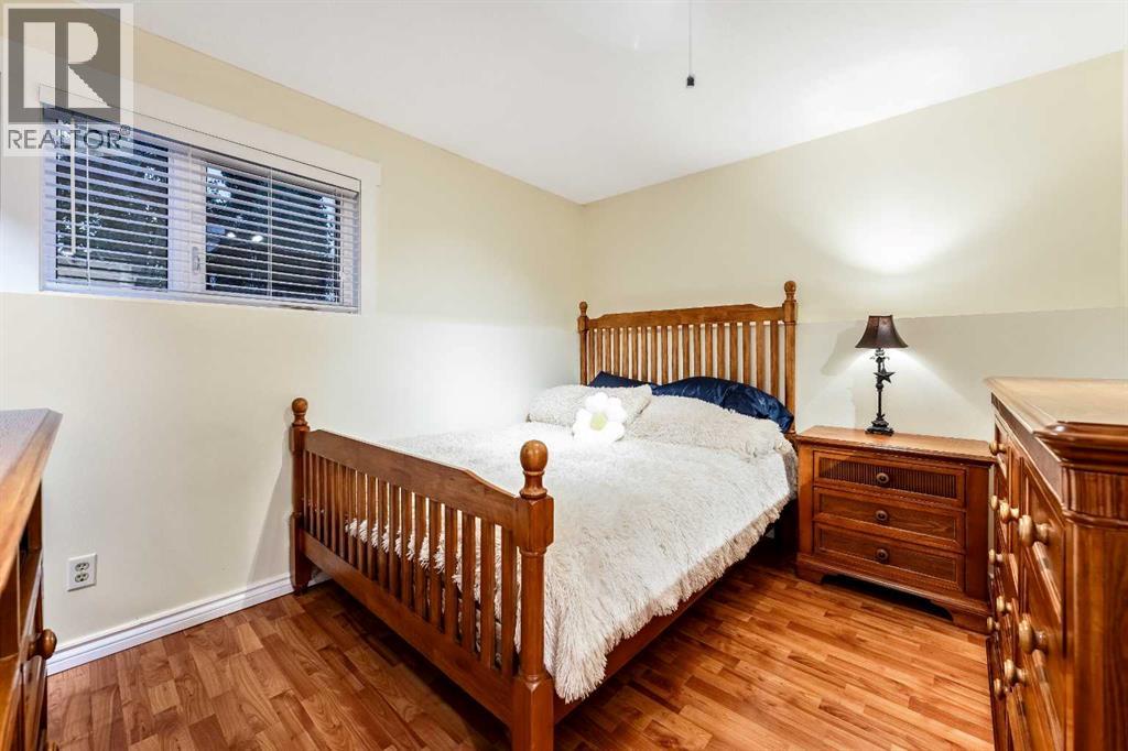 Single Family House Bi-level for Sale in  Riverstone Crescent SE Riverbend Calgary 