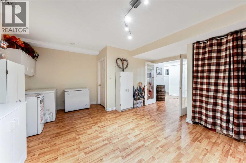 Single Family House Bi-level for Sale in  Riverstone Crescent SE Riverbend Calgary 