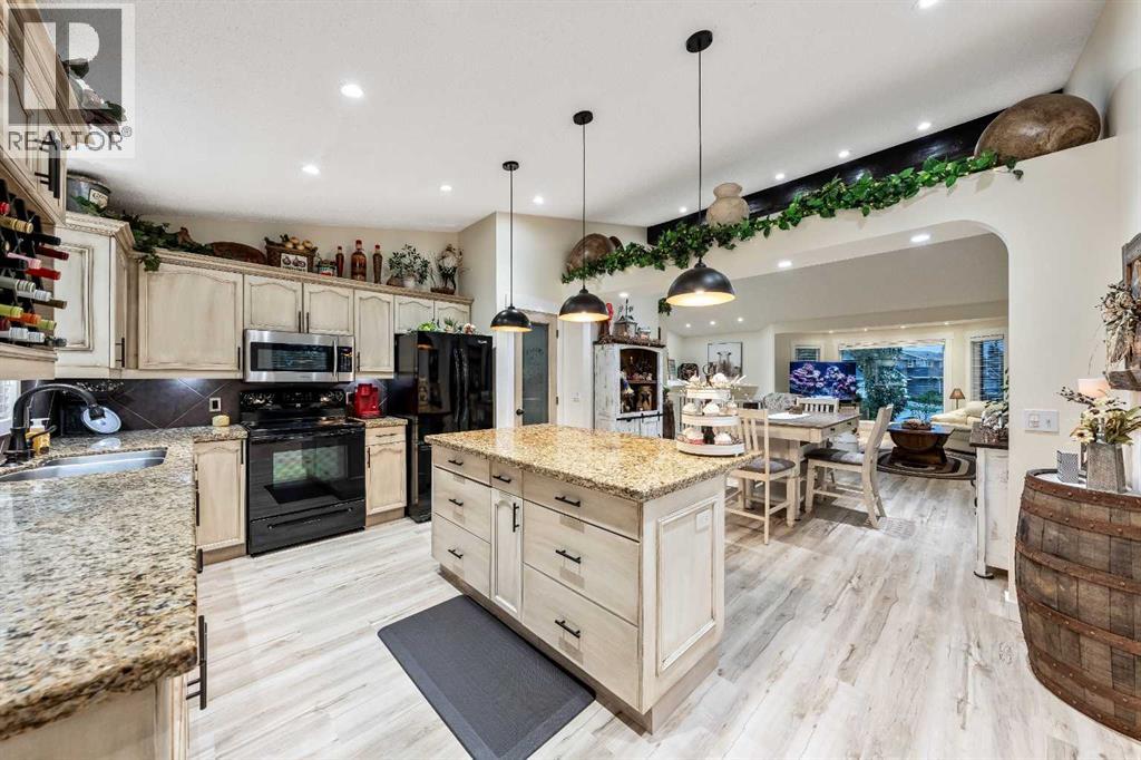 Single Family House Bi-level for Sale in  Riverstone Crescent SE Riverbend Calgary 