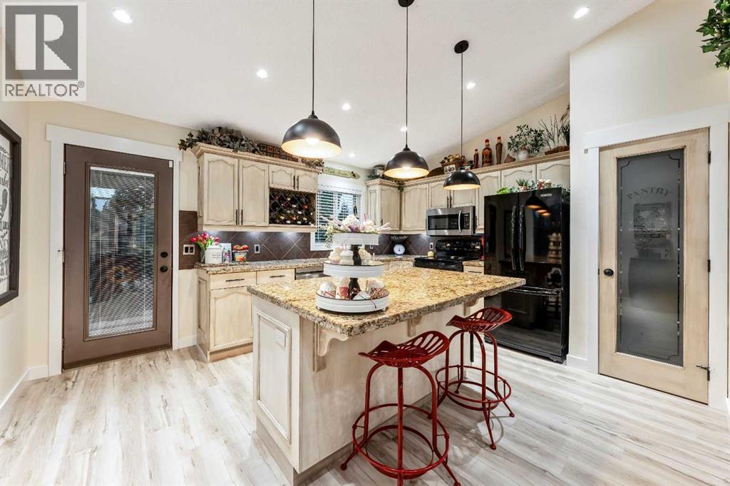 Single Family House Bi-level for Sale in  Riverstone Crescent SE Riverbend Calgary 