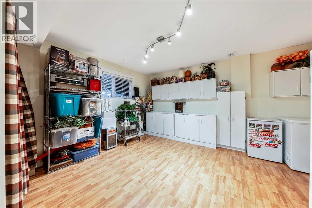 Single Family House Bi-level for Sale in  Riverstone Crescent SE Riverbend Calgary 
