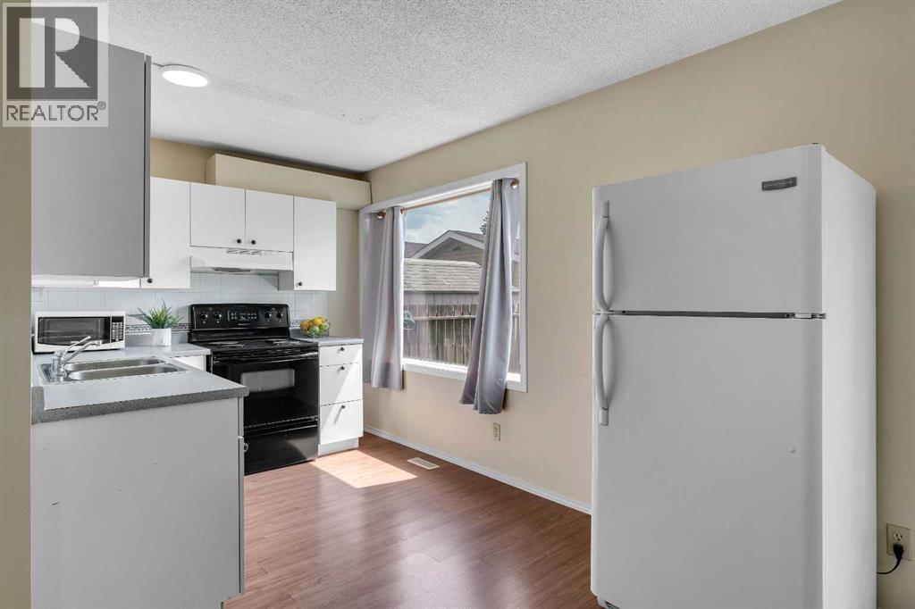 Single Family House 4 Level for Sale in  Falmere Way NE Falconridge Calgary 