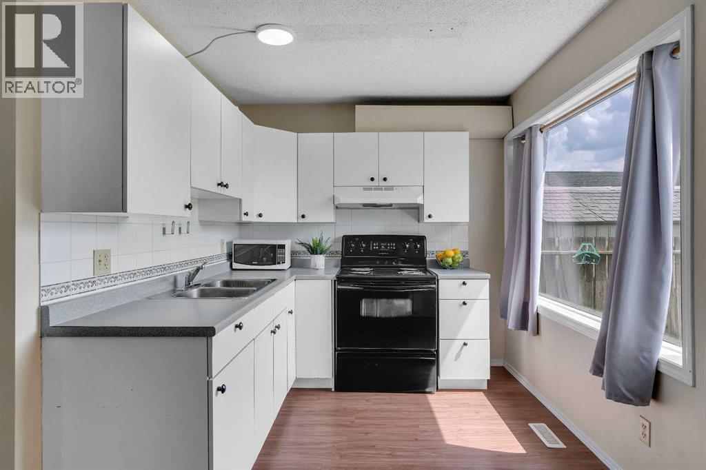 Single Family House 4 Level for Sale in  Falmere Way NE Falconridge Calgary 